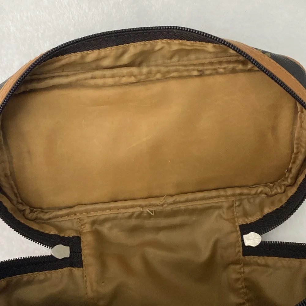 Dark brown royal-themed cosmetics bag